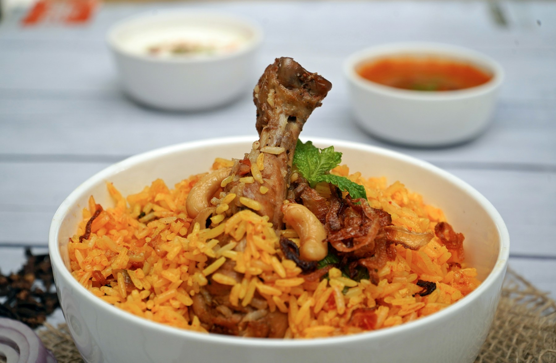 Chicken biryani served with gravy